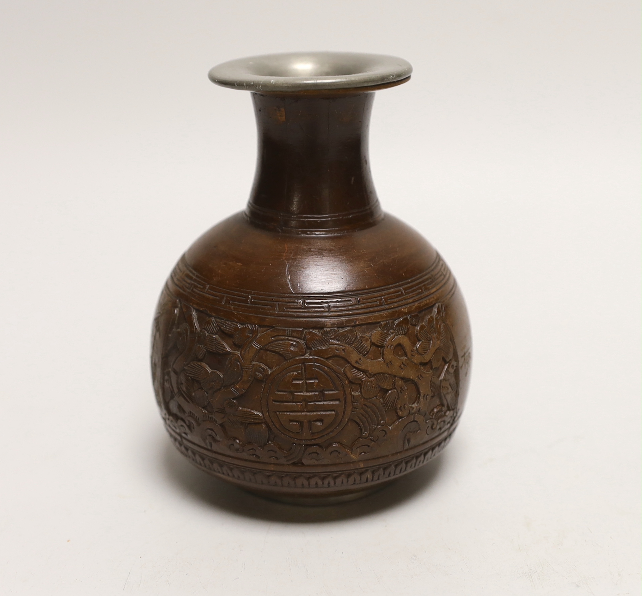 A Chinese coconut and pewter vase, 14cms high